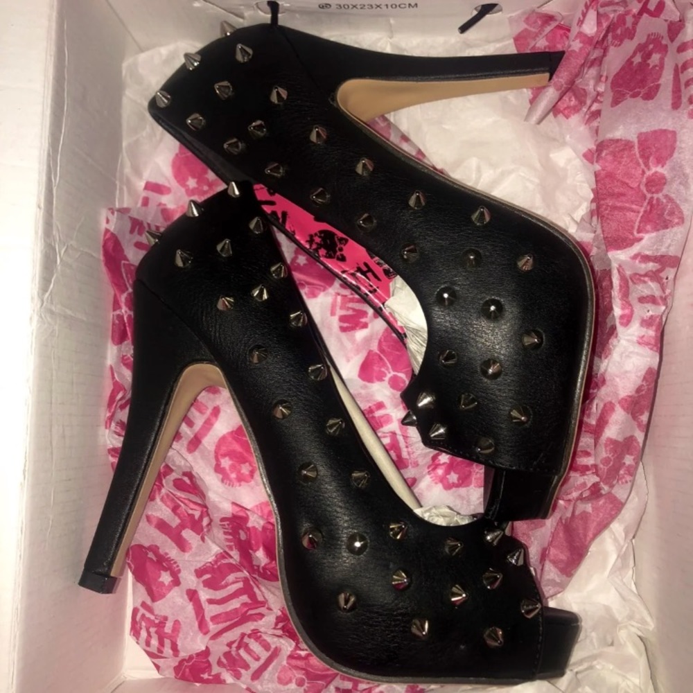 Spiked black heels